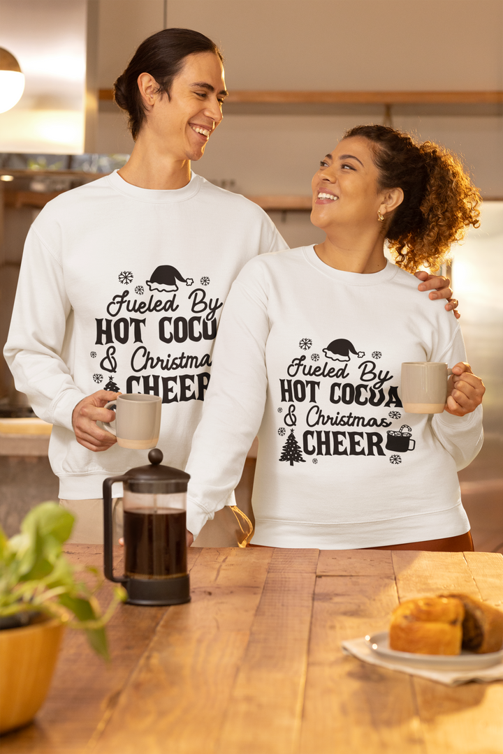 "Fueled by Hot Cocoa & Christmas Cheer" Unisex Sweatshirt for Christmas Eve, Christmas celebration by RanggRiwaaz