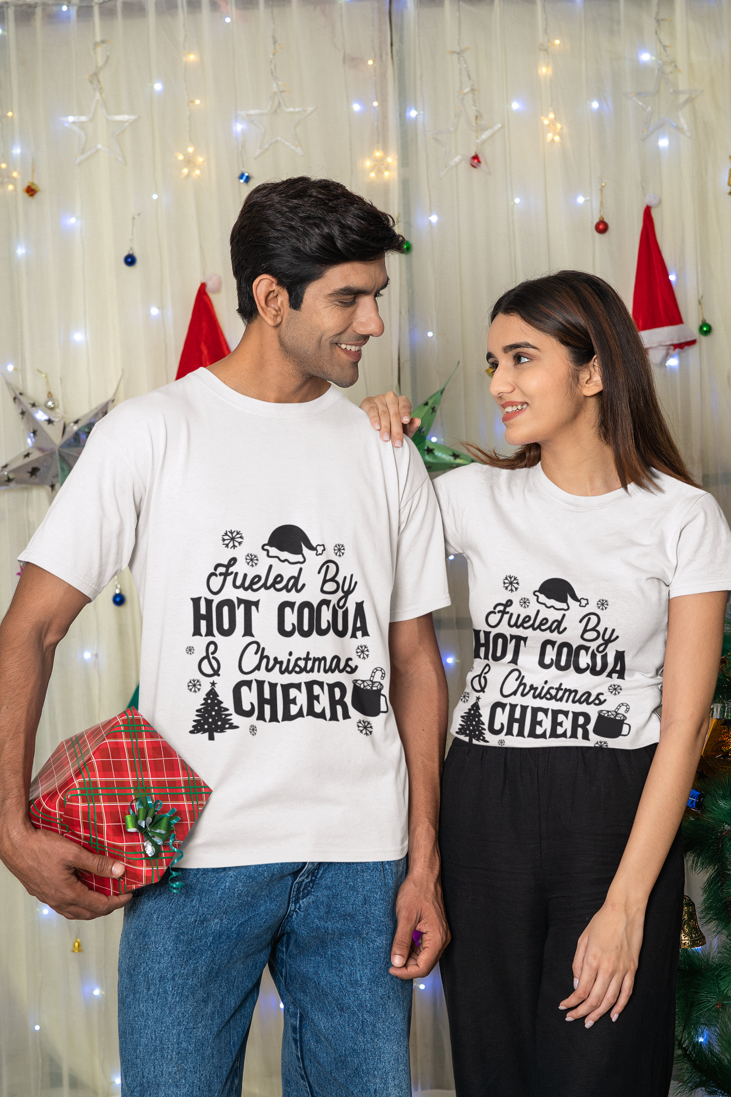 "Fueled by Hot Cocoa & Christmas Cheer" Family T-shirt for Christmas Eve, Christmas celebration by RanggRiwaaz